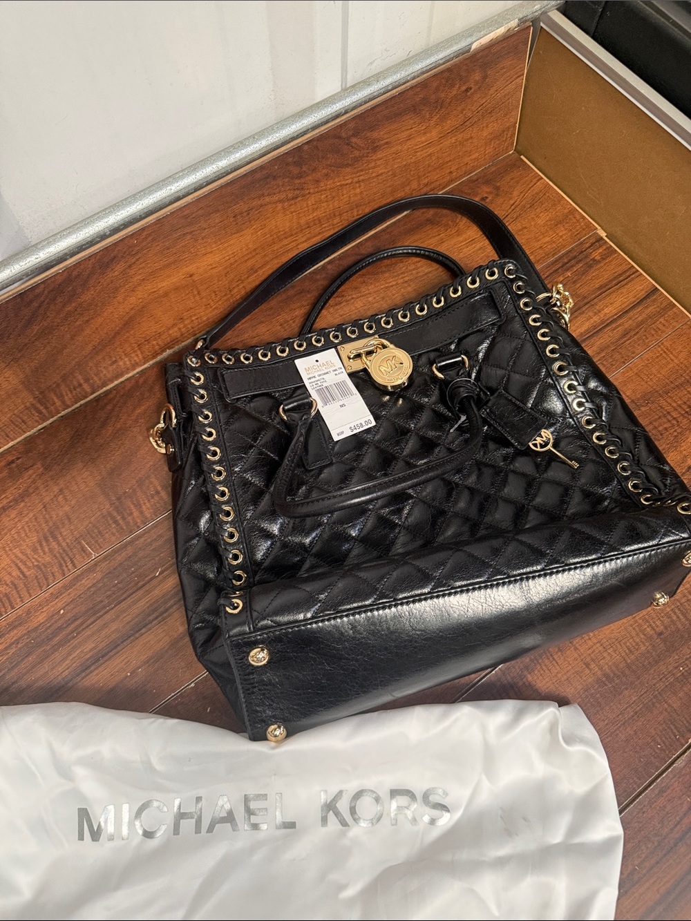 Michael Kors Black Quilted Satchel with Gold Hardware and Grommet Trim